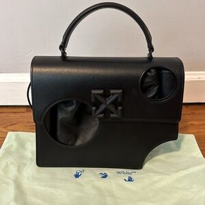 Black 1.4 jitney holes bag with plastic accessories bag and dust bag